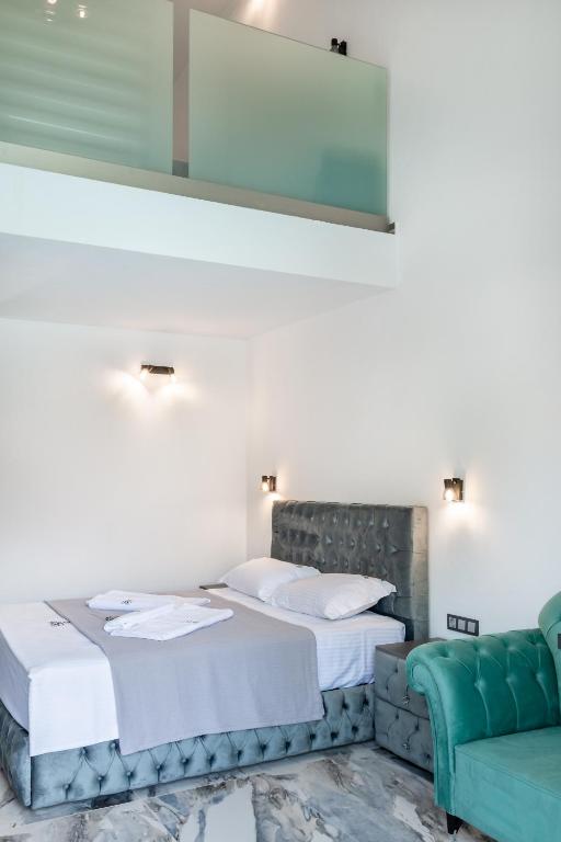 Postel nebo postele na pokoji v ubytování B&B Lofts Thassos