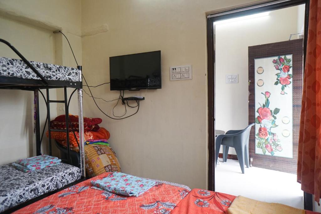 Postel nebo postele na pokoji v ubytování Villa Sea Blue - Homestay in Pondicherry