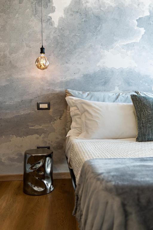 Katil atau katil-katil dalam bilik di Cadamare charming rooms in Portovenere