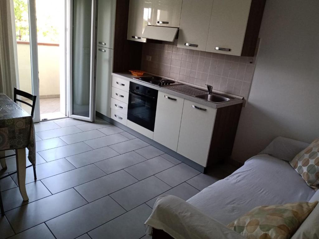Kuchyň nebo kuchyňský kout v ubytování Residence VAPORE