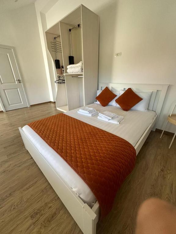 Postel nebo postele na pokoji v ubytování Ami Residence Bucharest Airport&Therme&Parking