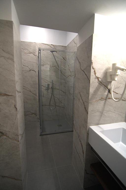 Koupelna v ubytování Giuliani Rooms