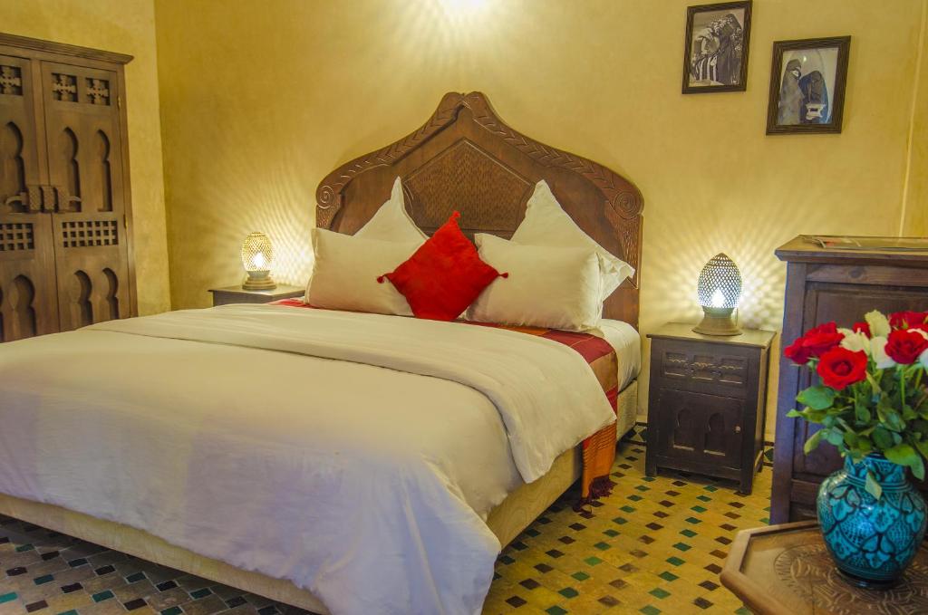 Rúm í herbergi á Riad Sidi Fatah