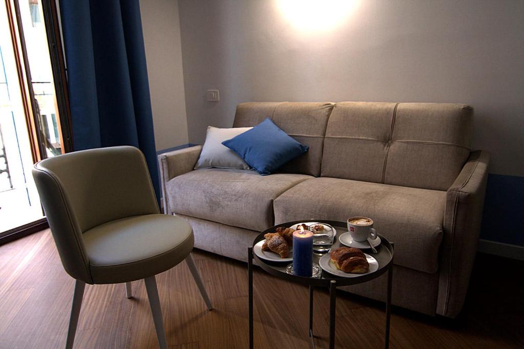 Posezení v ubytování Giuliani Rooms