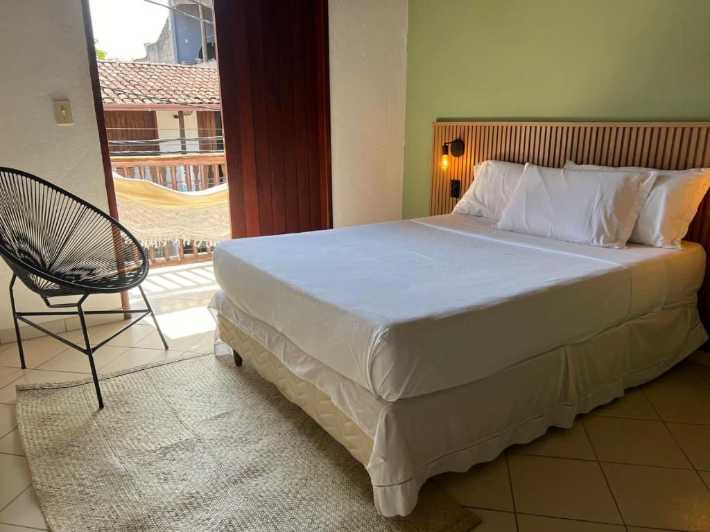 Cama ou camas em um quarto em Pousada Estrela Itacaré