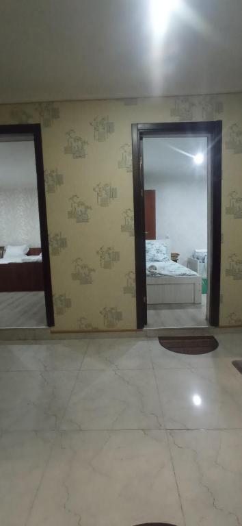 Postel nebo postele na pokoji v ubytování HOTEL LukaRabati