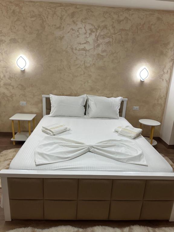 Postel nebo postele na pokoji v ubytování Guni Inn