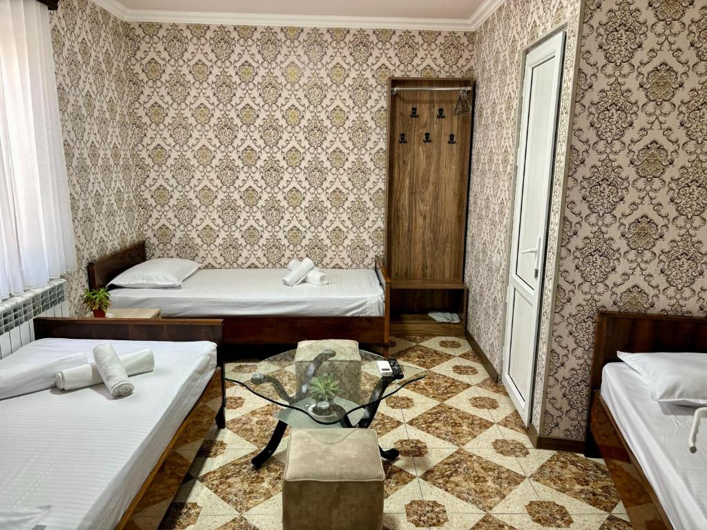 Postel nebo postele na pokoji v ubytování Styopa Hotel