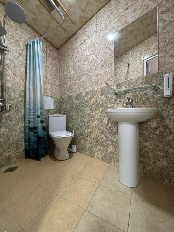 Koupelna v ubytování Styopa Hotel