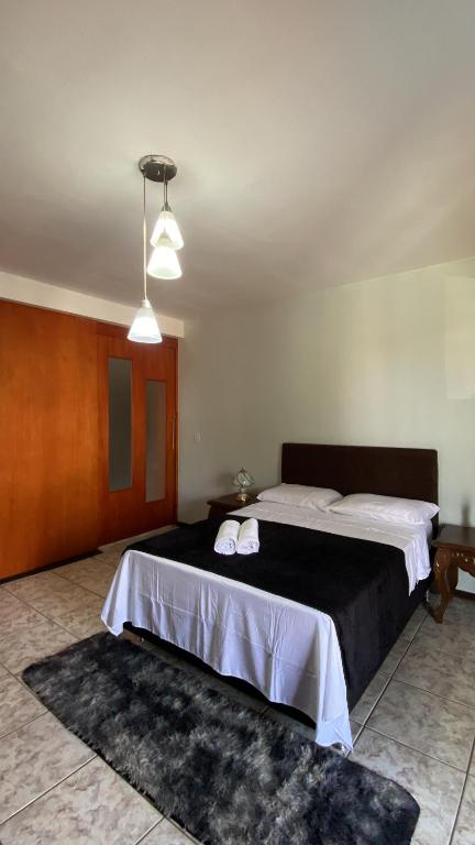 Postel nebo postele na pokoji v ubytování Triana Guest House