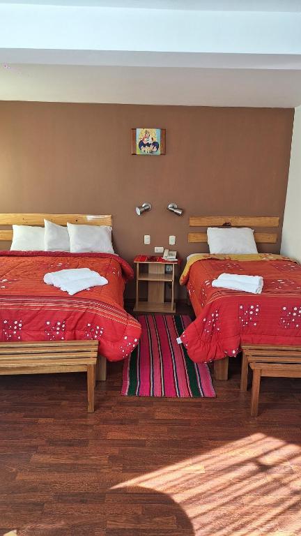 Postel nebo postele na pokoji v ubytování kuntur inn hotel