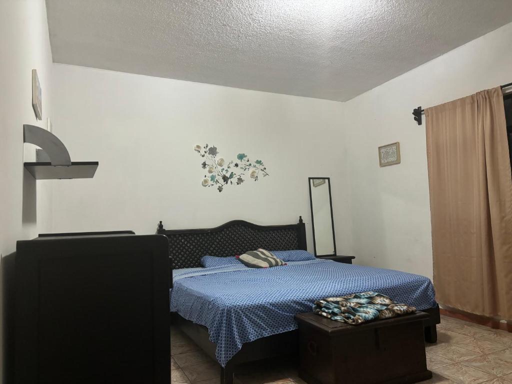Postel nebo postele na pokoji v ubytování Hostal 509