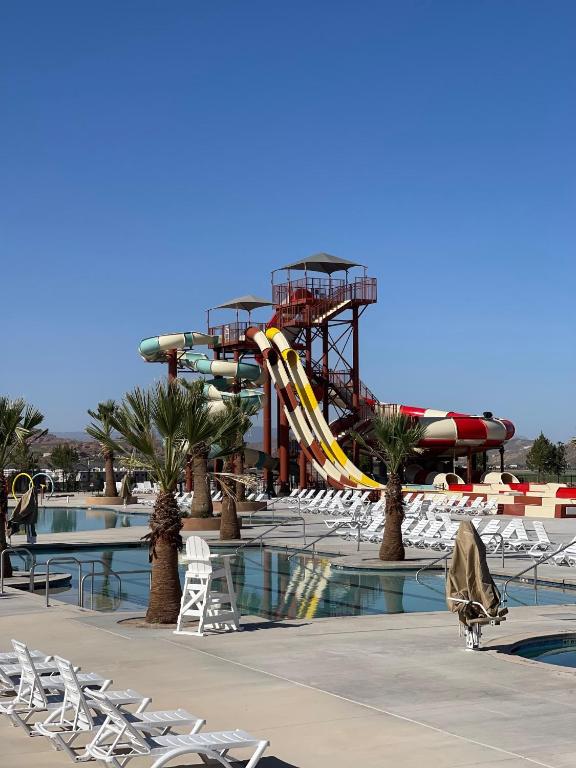 a water park with a roller coaster and slides at Zion Utah Jellystone Park in Hurricane