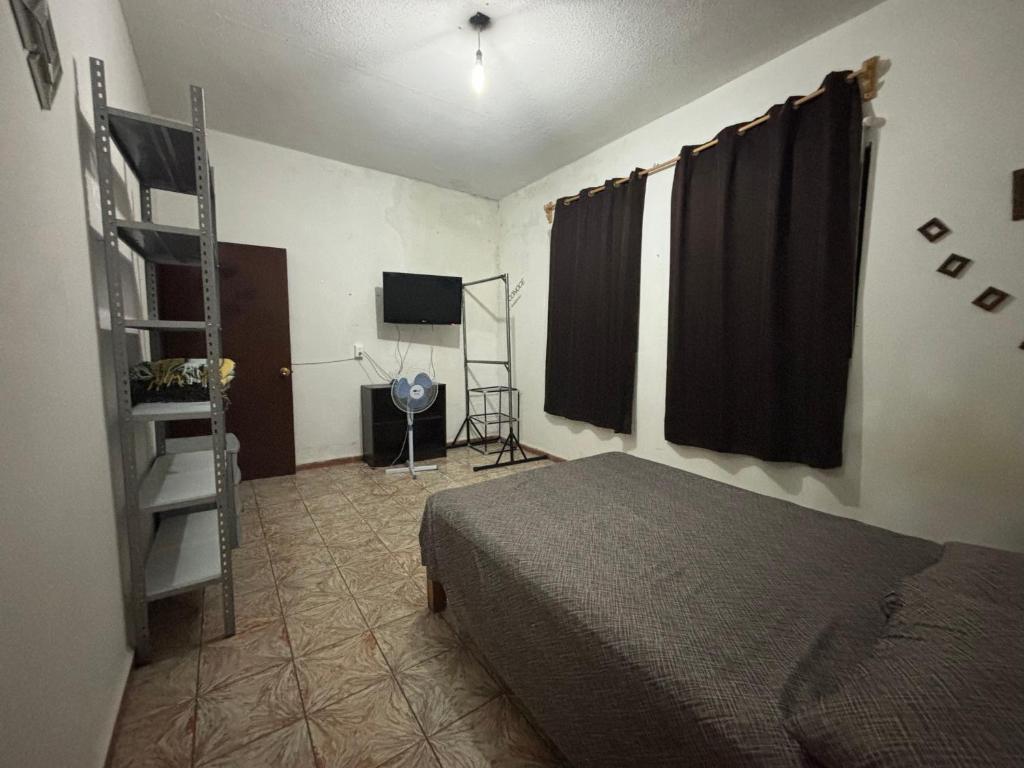 TV a/nebo společenská místnost v ubytování Hostal 509