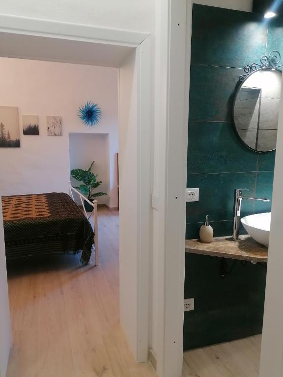 Postel nebo postele na pokoji v ubytování Camera Botanica