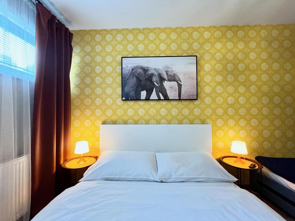 Postel nebo postele na pokoji v ubytování Apartmány Nad ZOO