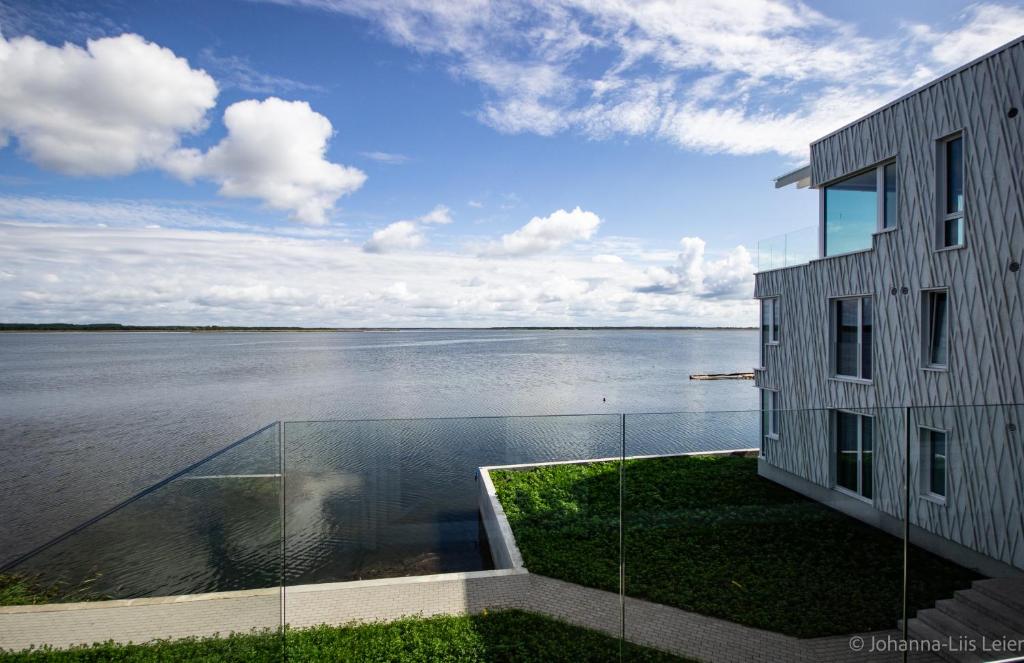 a house with a view of a body of water at Sadama Guest Apartment in Haapsalu