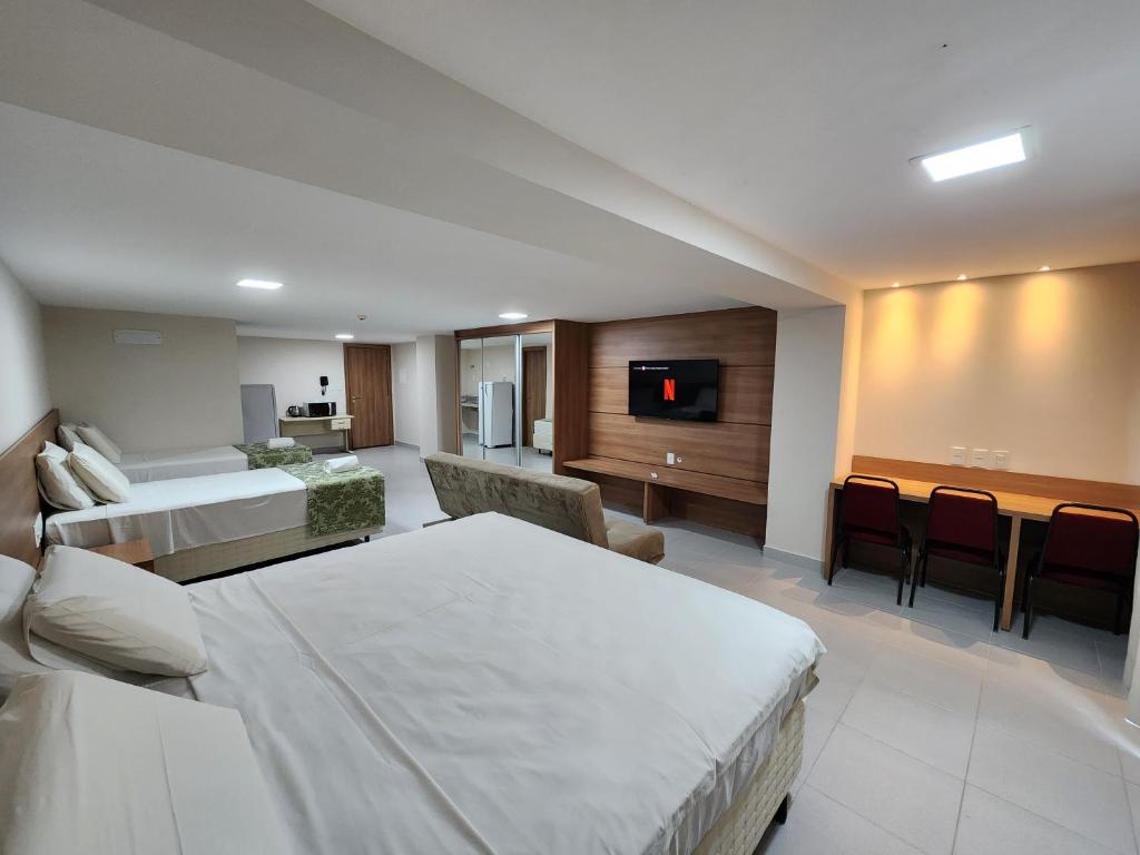 Μια τηλεόραση ή/και κέντρο ψυχαγωγίας στο Suíte Vista Mata Atlântica - Vista Azul