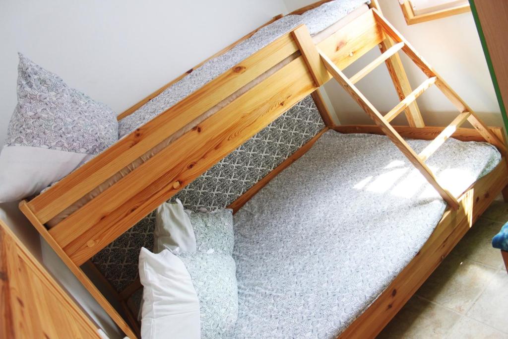 Postel nebo postele na pokoji v ubytování Kwiatu Paproci
