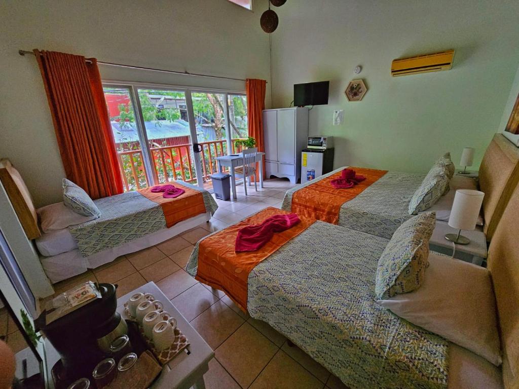 Postel nebo postele na pokoji v ubytování BellaVista Suites By Villas Verdes - Samara Beach