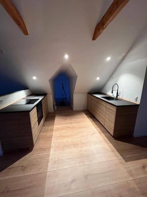 a large kitchen with a sink and a sink at Kragenæs Havn in Torrig