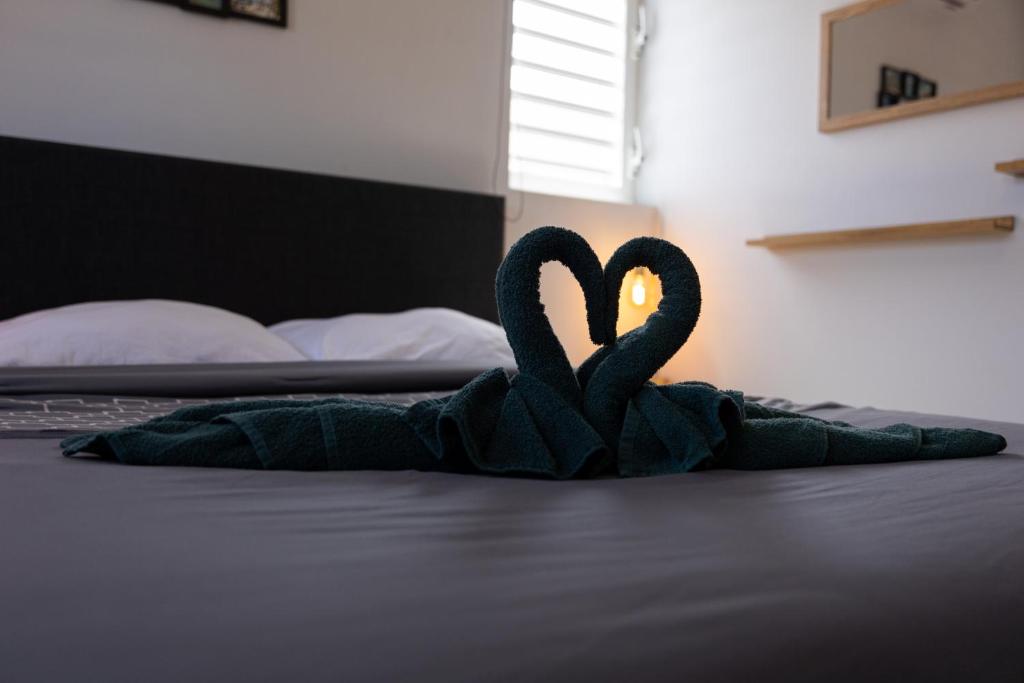 Postel nebo postele na pokoji v ubytování Av Curacao - Centrally Located Spacious Apartment