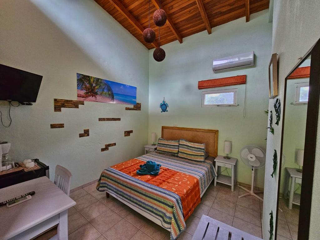 Postel nebo postele na pokoji v ubytování BellaVista Suites By Villas Verdes - Samara Beach