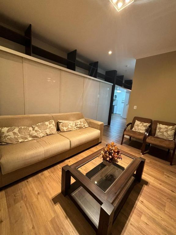 Posezení v ubytování Flat em Gramado
