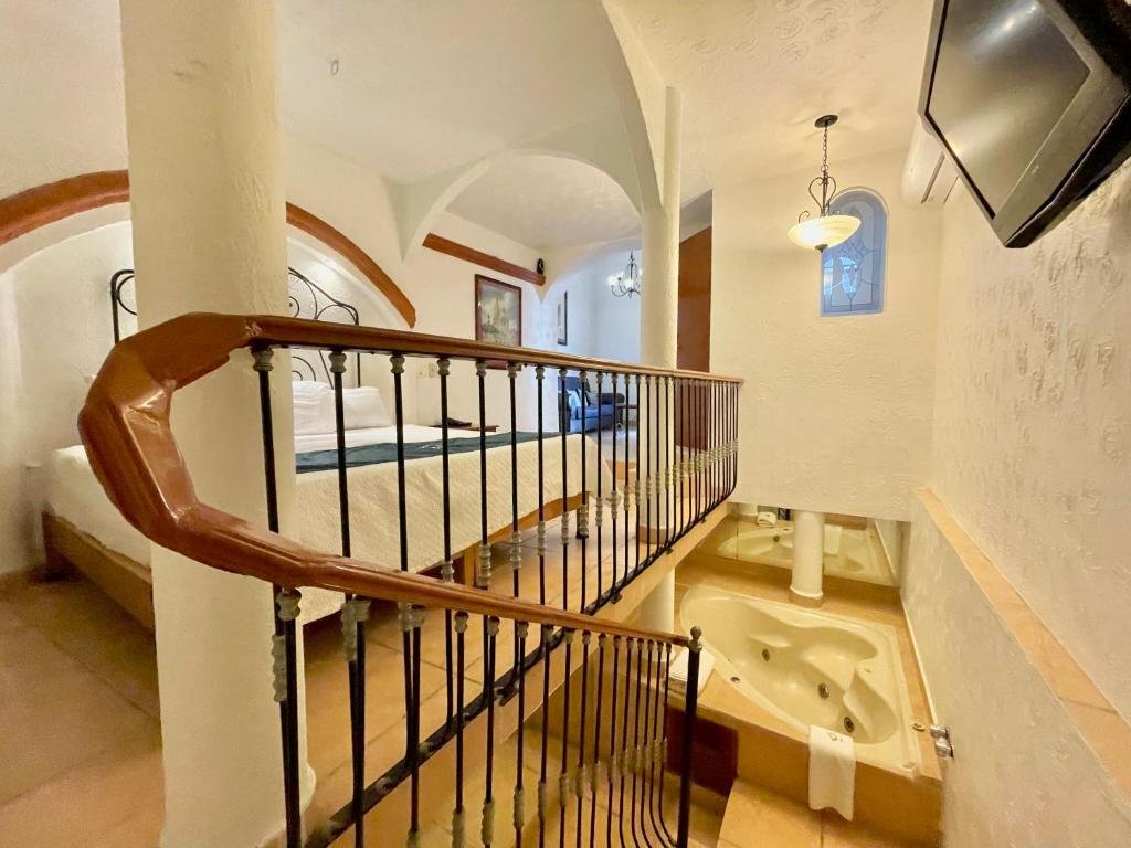 Postel nebo postele na pokoji v ubytování Hotel Frances