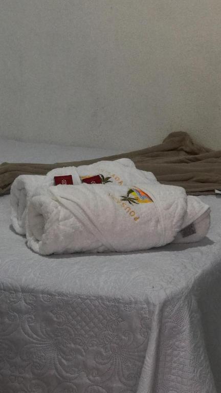 Cama ou camas em um quarto em Pousada Giro das dunas