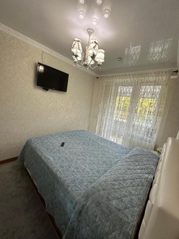 Postel nebo postele na pokoji v ubytování InaHome