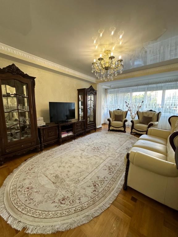 TV a/nebo společenská místnost v ubytování InaHome