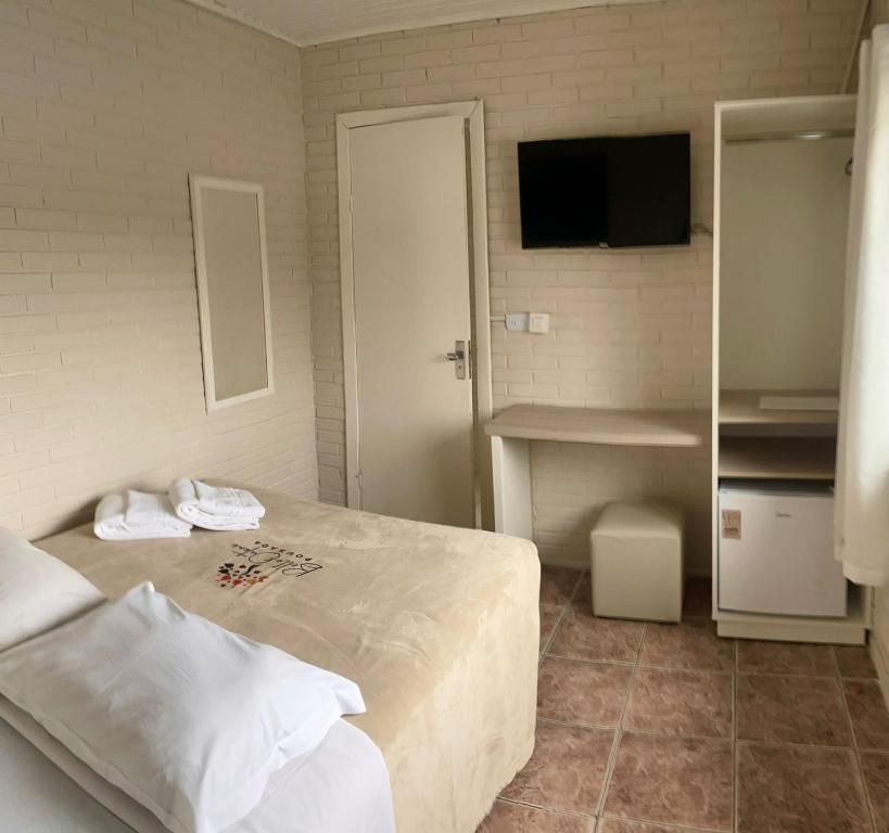 Postel nebo postele na pokoji v ubytování Pousada Bello Outono