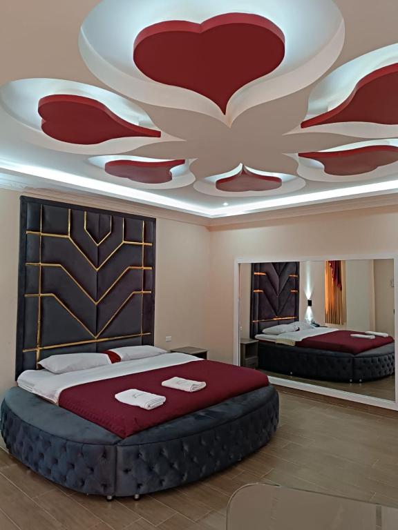 Postel nebo postele na pokoji v ubytování Hostal Kapital City
