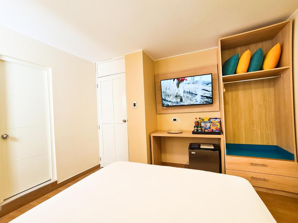 Kuchyň nebo kuchyňský kout v ubytování Acuario Hotel & Suite