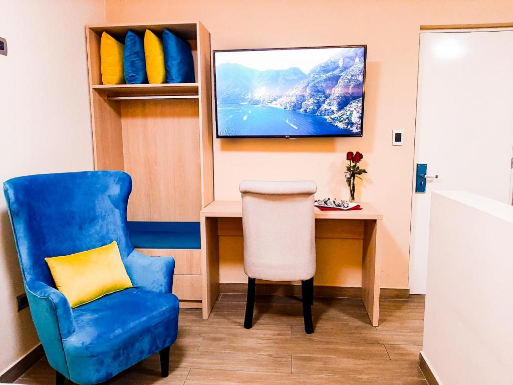 Posezení v ubytování Acuario Hotel & Suite