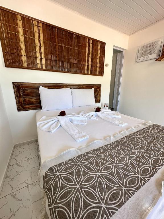 Postel nebo postele na pokoji v ubytování Mar à Vista Ilha de Boipeba