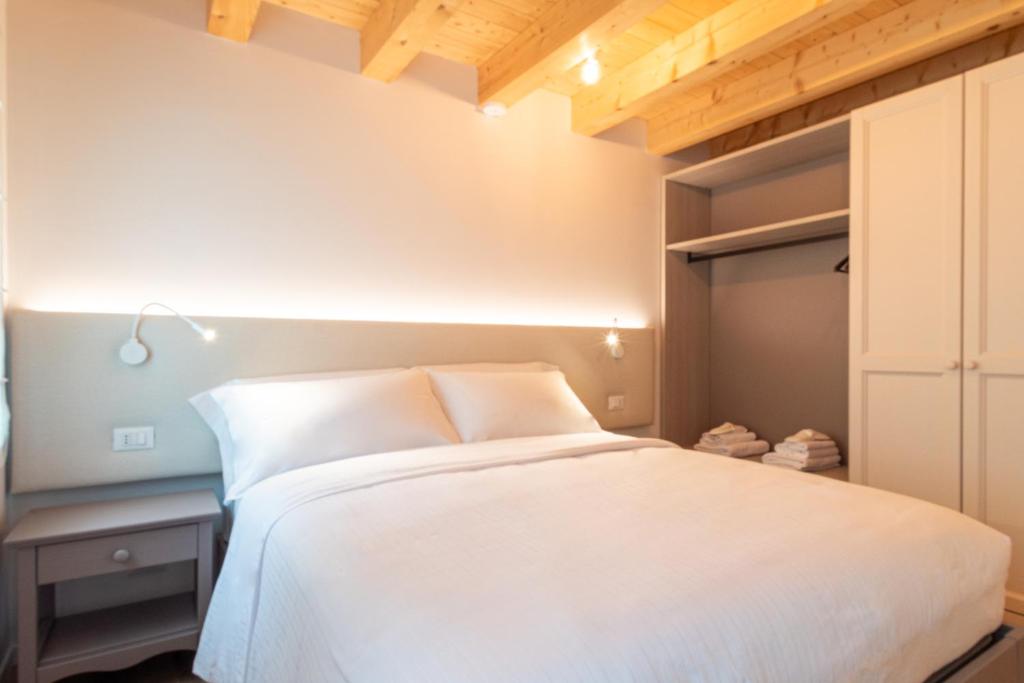 Postel nebo postele na pokoji v ubytování BORGO STALIS RESORT