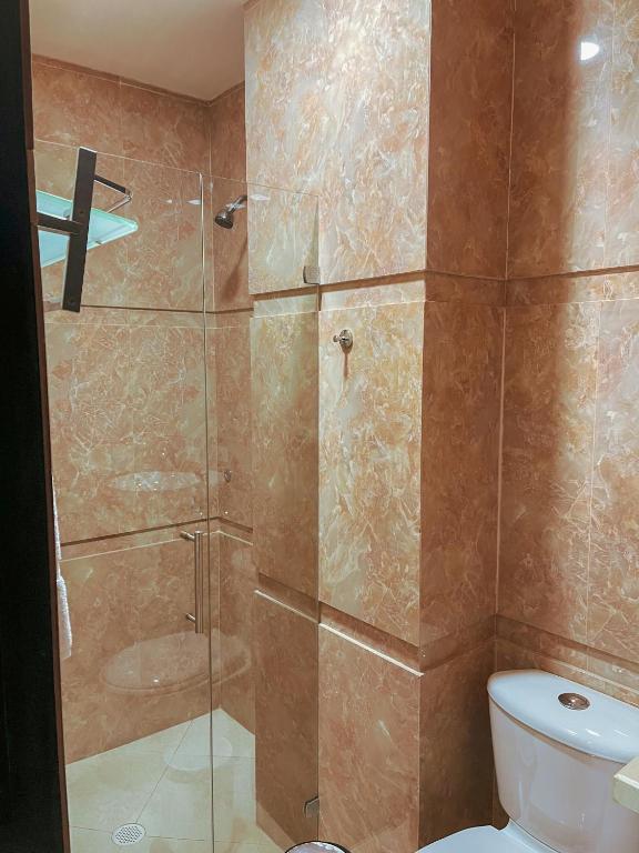 Koupelna v ubytování Hotel Plaza Manfortt