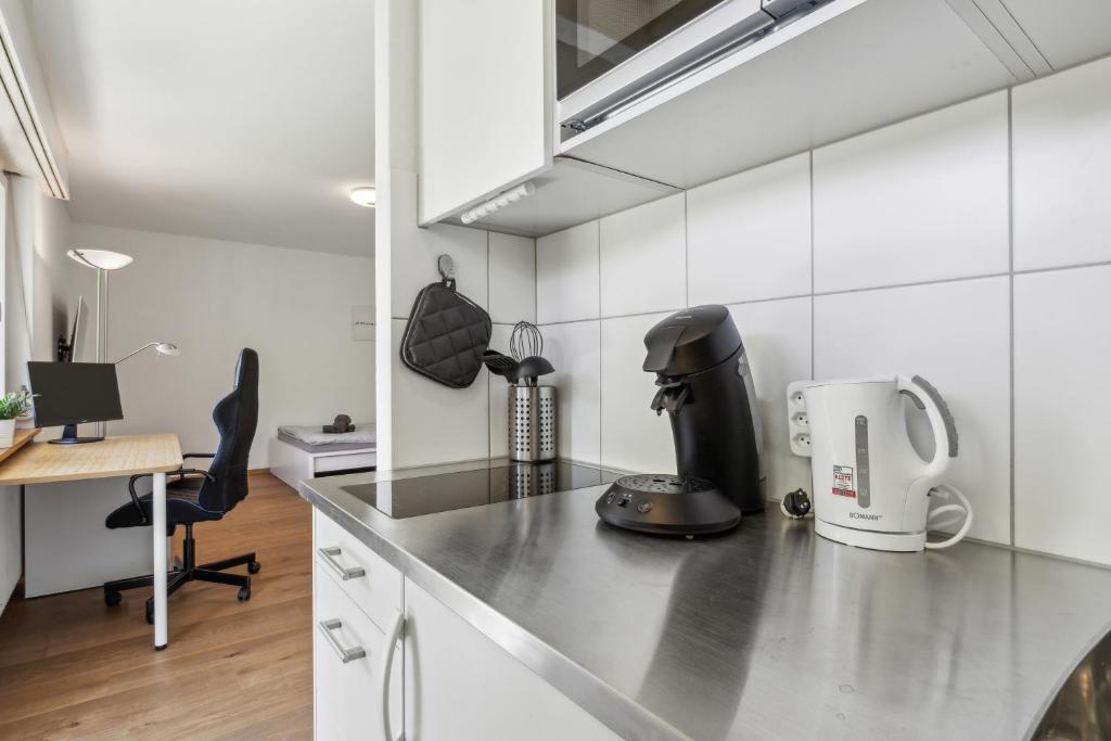 Kuchyň nebo kuchyňský kout v ubytování Pearlstay - Quiet Location Workplace Parking Washer