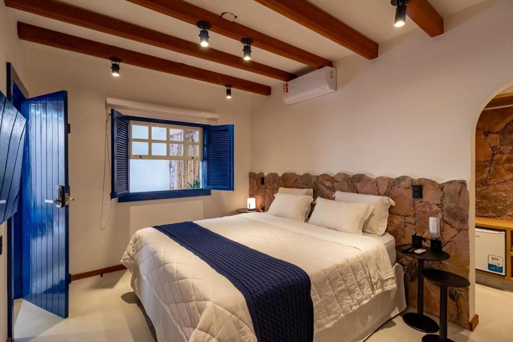 Postel nebo postele na pokoji v ubytování Villa Hortensia