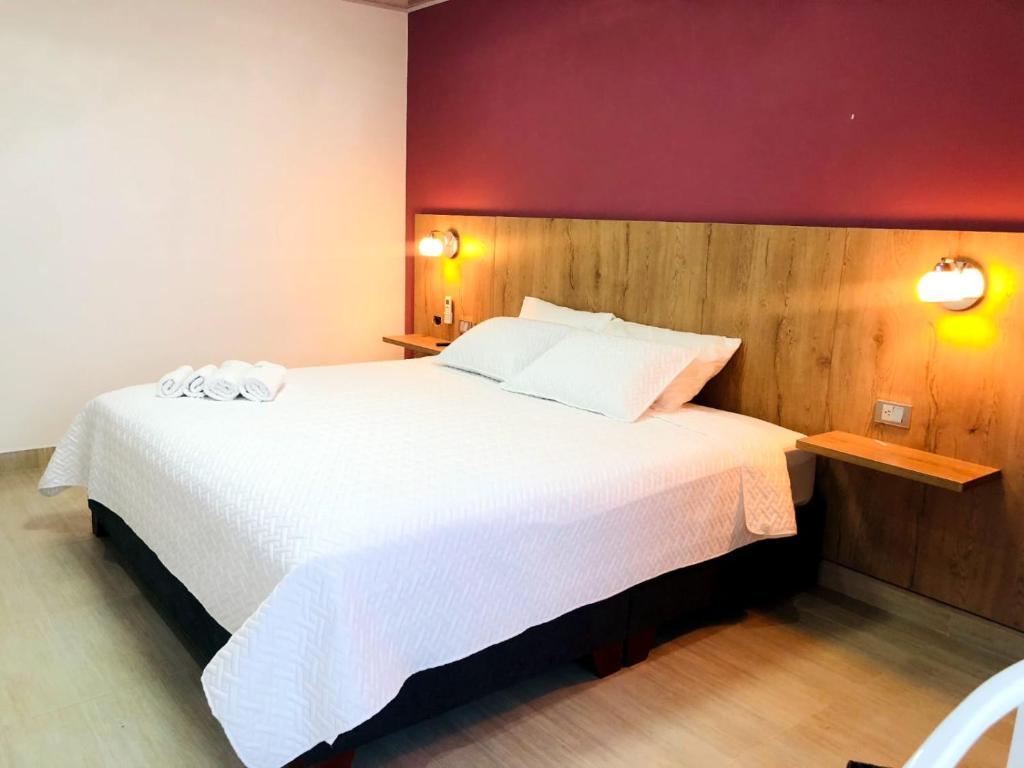 Postel nebo postele na pokoji v ubytování Hotel Divaca