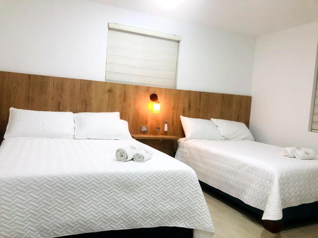 Postel nebo postele na pokoji v ubytování Hotel Divaca