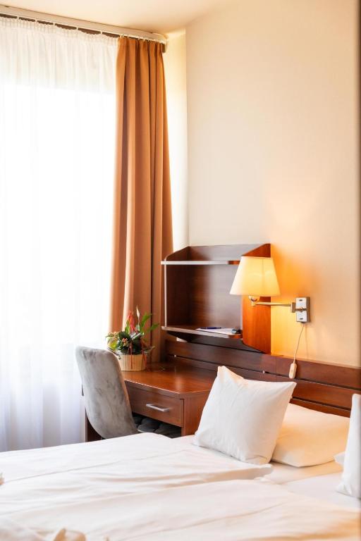 Postel nebo postele na pokoji v ubytování Hotel Estella Superior
