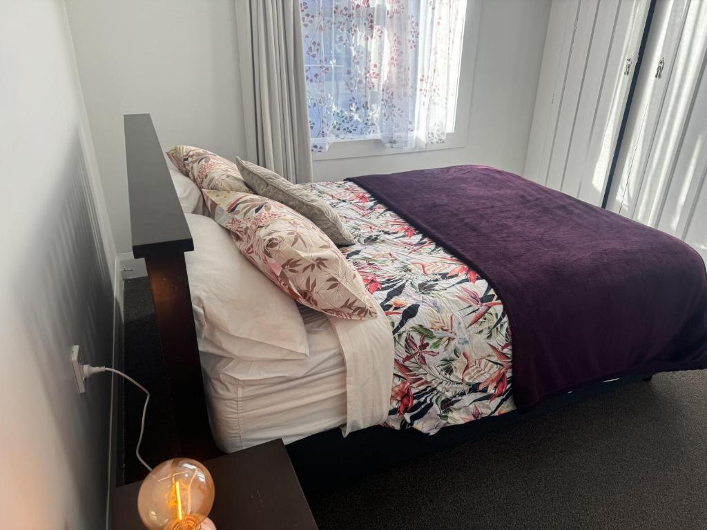 Postel nebo postele na pokoji v ubytování Shazza Homestay