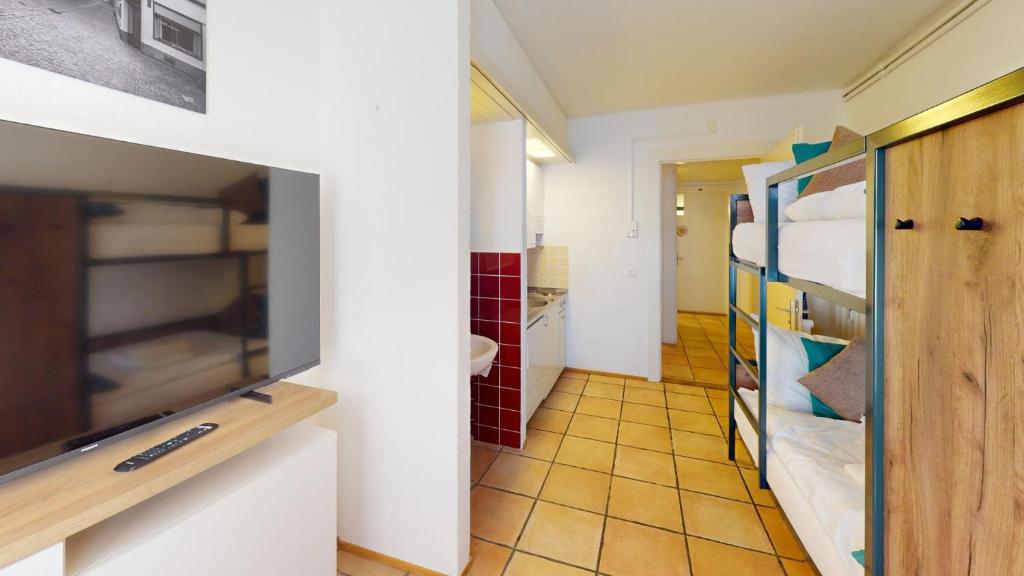 Kuchyň nebo kuchyňský kout v ubytování Zentral Altstadt Chur - Bahnhofsnah - Ferienwohnung - Bernina Express - Solution-Grischun
