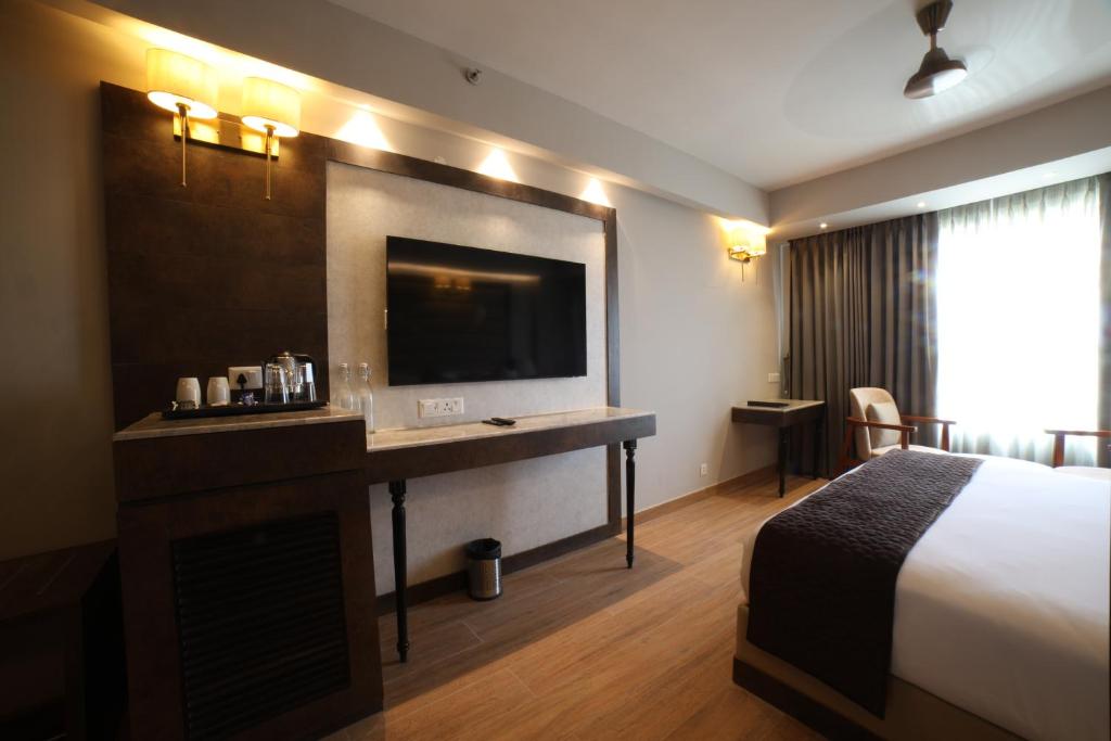 Postel nebo postele na pokoji v ubytování Northin Hotel