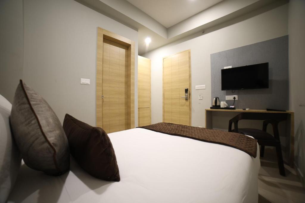 Postel nebo postele na pokoji v ubytování Northin Hotel