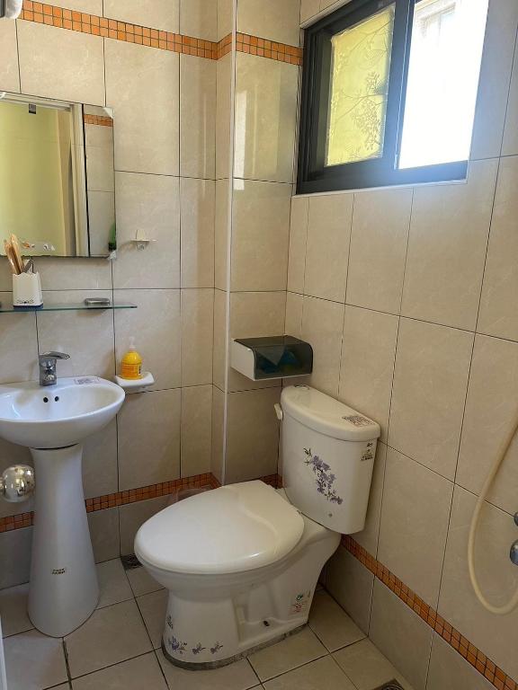 Koupelna v ubytování Yi Jia Homestay