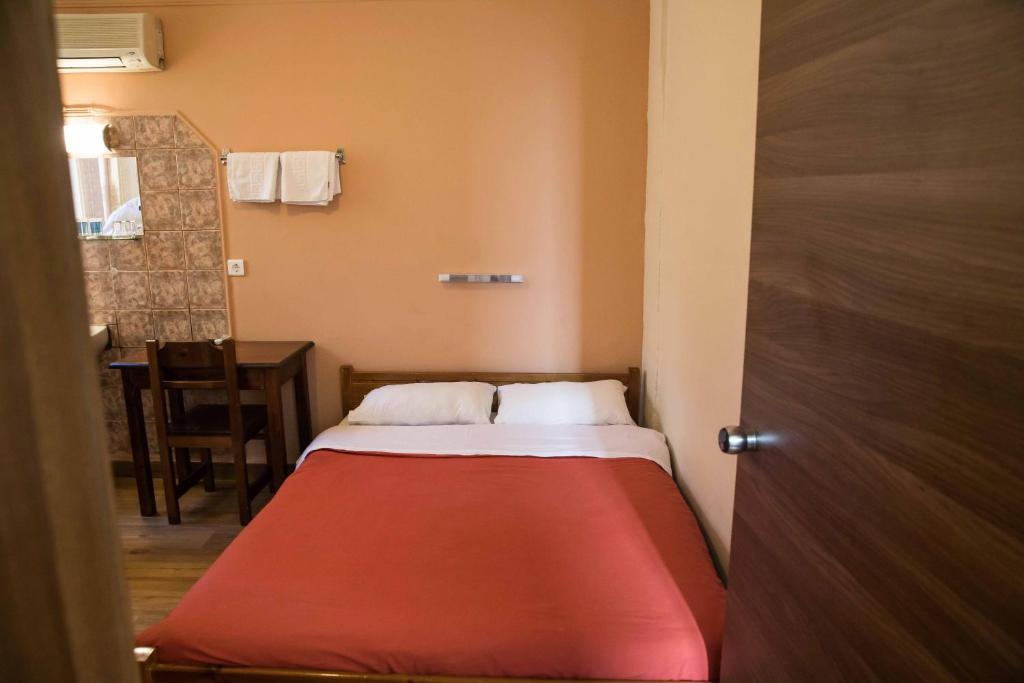 Posteľ alebo postele v izbe v ubytovaní Tempi Hotel